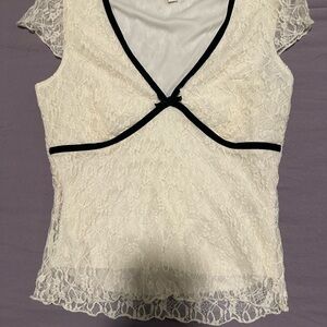Elegant Lace Top with Black Trim